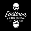 Easttown Barbershop logo a barber pole with a scripted Easttown Barbershop Established 1958 against a black background