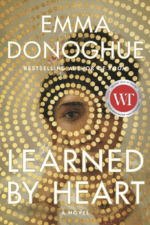 The cover of Emma Donoghue's latest book "Learned by Heart". A series of painted gold circles encircling a woman's eye with the title and author's name.