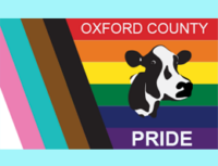 Image of a cow against the pride/profess flag